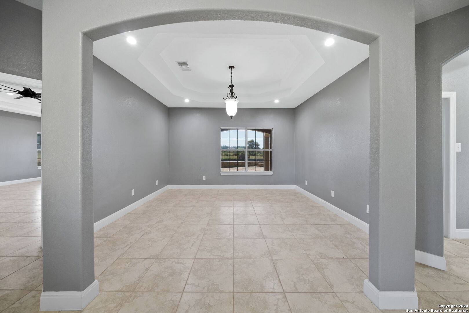 3022 Interstate 35 Natalia, TX 78059 - Photo 19 of 49 a view of an empty room with a window