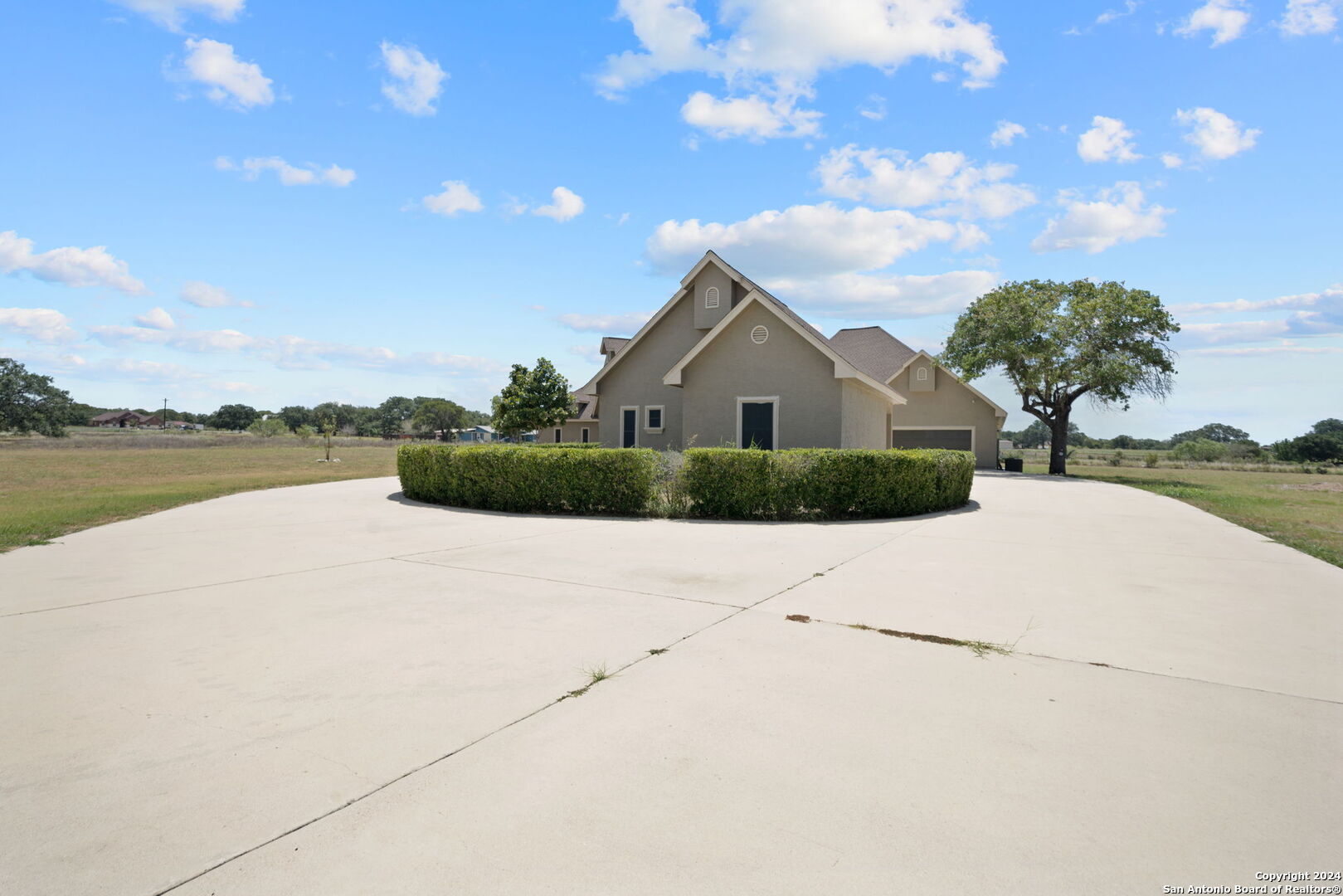 3022 Interstate 35 Natalia, TX 78059 - Photo 3 of 49 a view of a house with a yard
