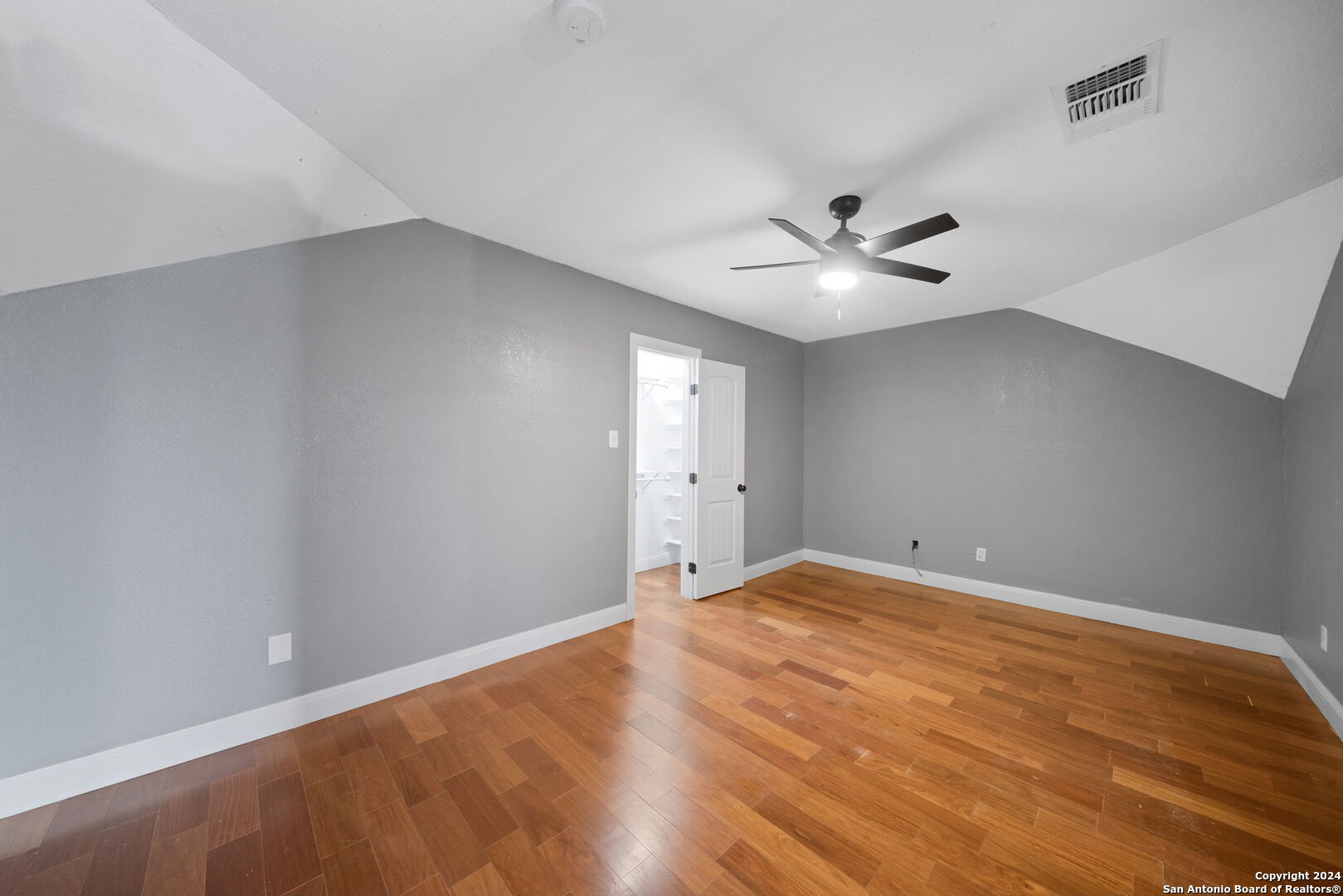 3022 Interstate 35 Natalia, TX 78059 - Photo 32 of 49 a view of an empty room with a ceiling fan