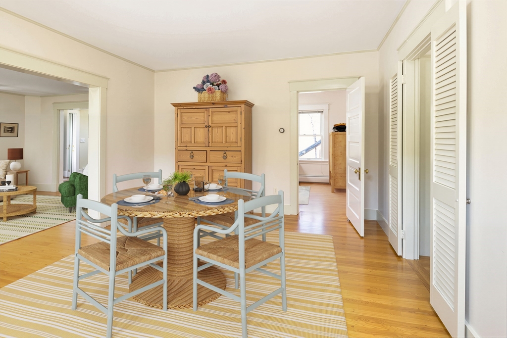 329 Front Street Marion, MA 02738 - Photo 14 of 42 a view of a dining room with furniture and wooden floor
