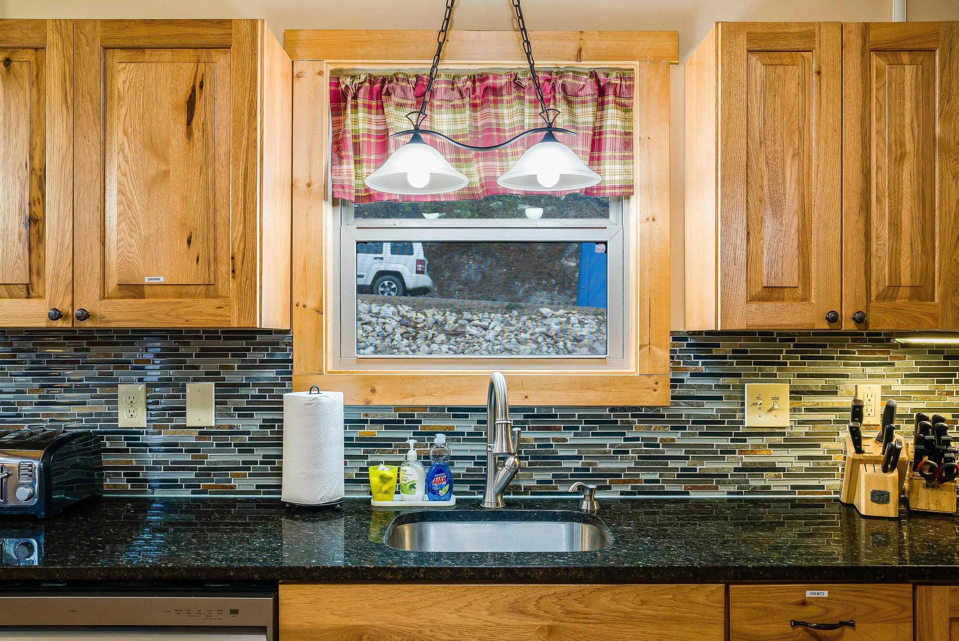 781 Rainier Road McGaheysville, VA 22840 - Photo 11 of 51 a kitchen with stainless steel appliances granite countertop a stove and a microwave