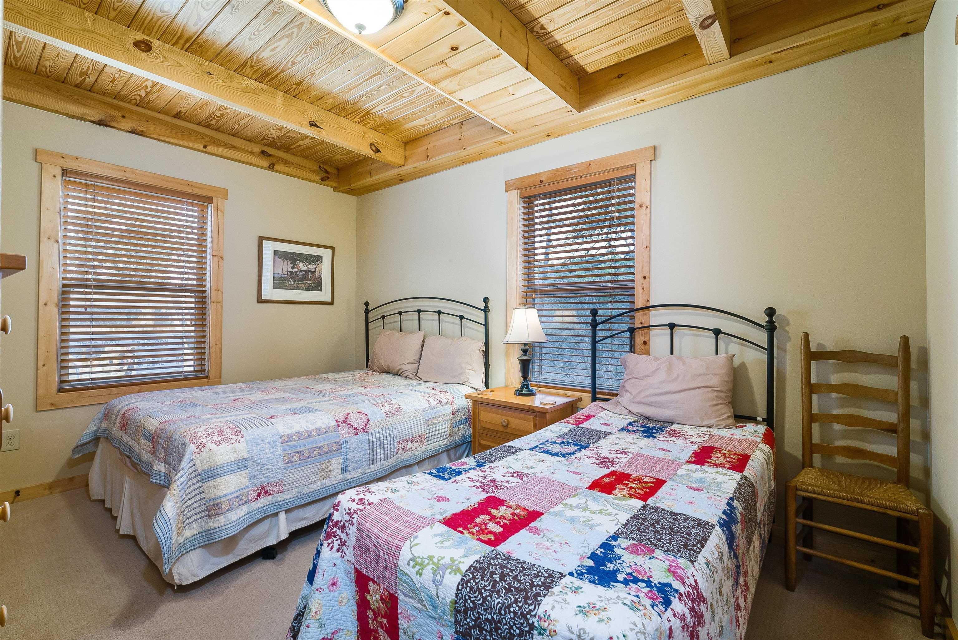 781 Rainier Road McGaheysville, VA 22840 - Photo 15 of 51 a bedroom with two beds and a large window