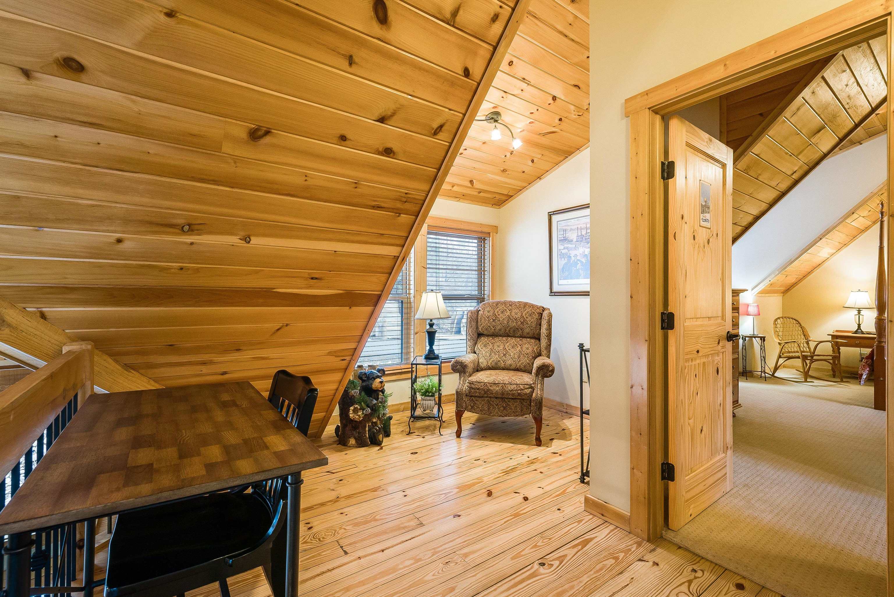781 Rainier Road McGaheysville, VA 22840 - Photo 21 of 51 a view of a balcony with chairs and wooden floor