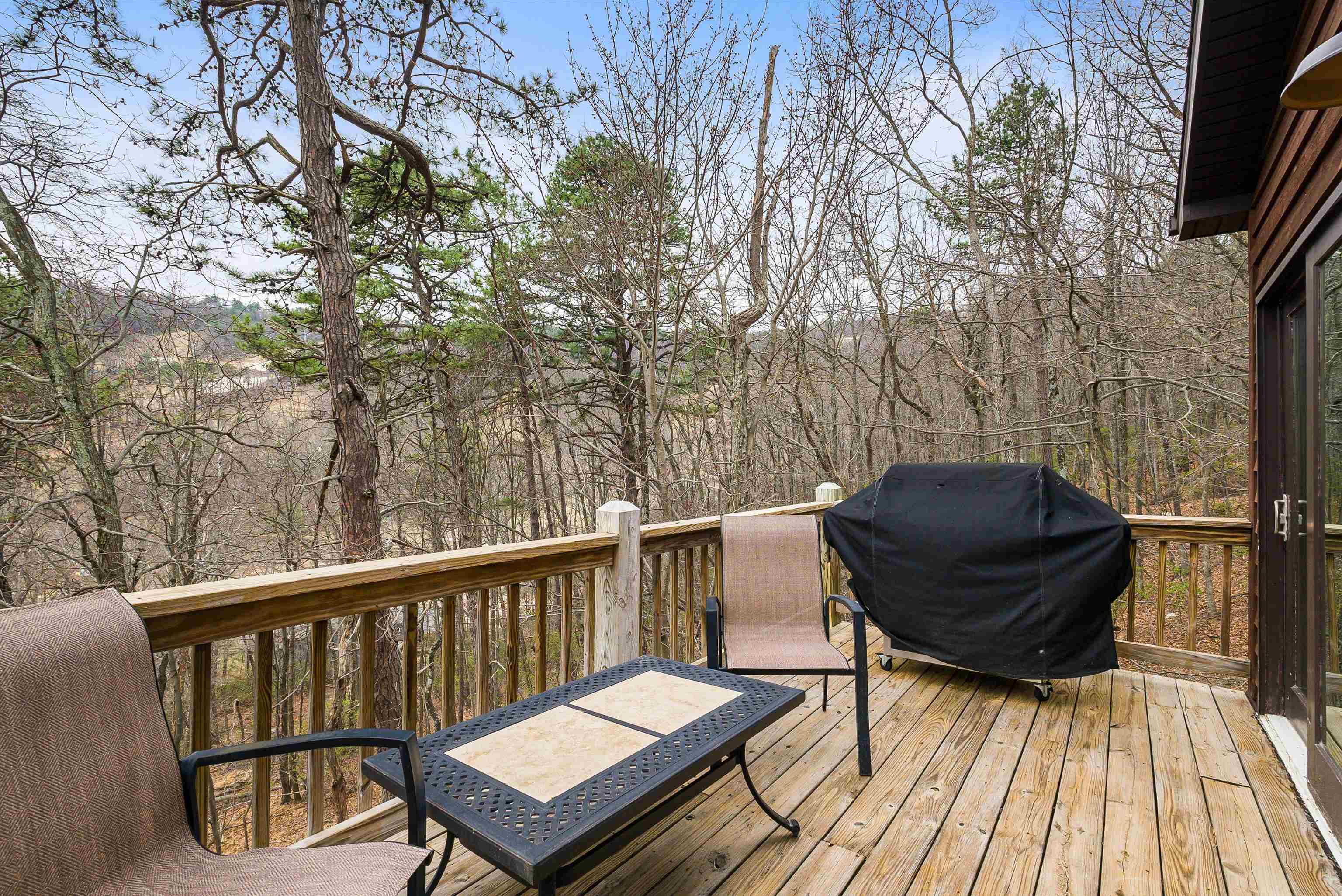 781 Rainier Road McGaheysville, VA 22840 - Photo 31 of 51 a view of a balcony with wooden floor and outdoor seating