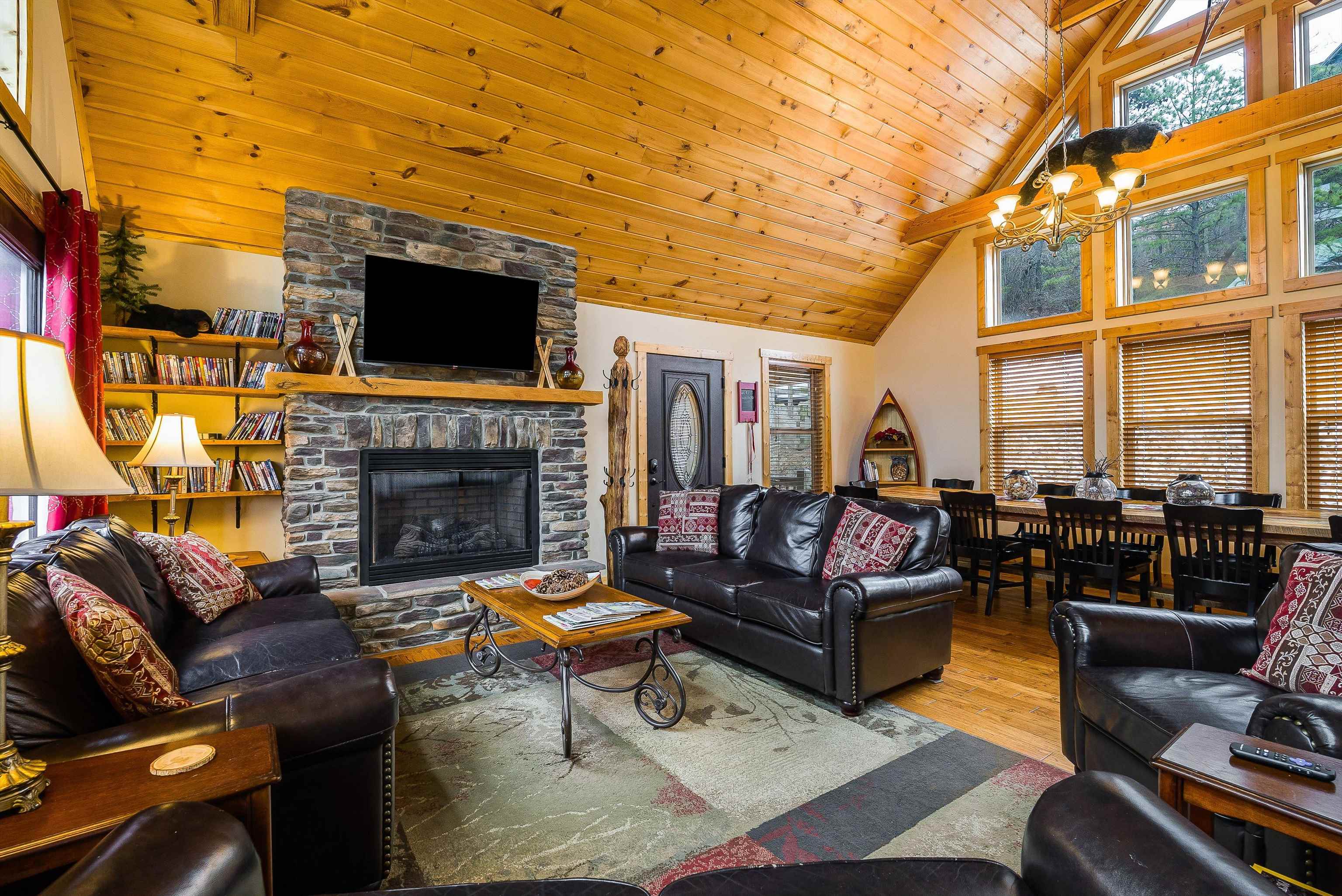 781 Rainier Road McGaheysville, VA 22840 - Photo 6 of 51 a living room with furniture a flat screen tv and a fireplace