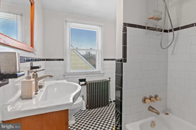 a bathroom with a sink and a tub