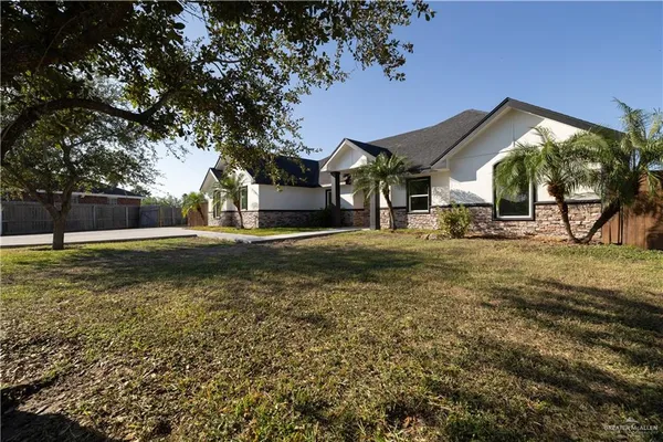 a front view of house with yard