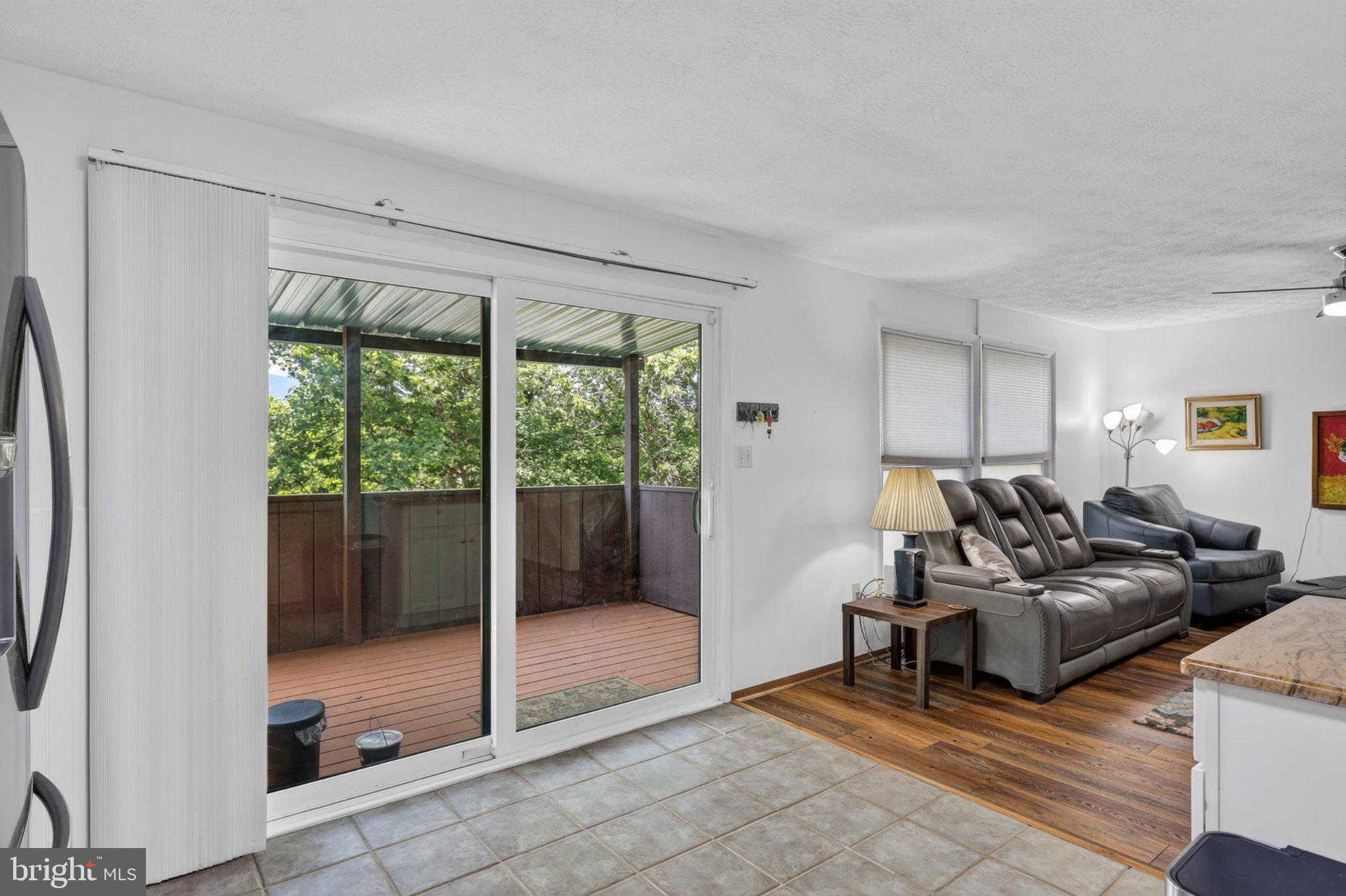 274 The Hill Road, Unit 13A Basye, VA 22810 - Photo 5 of 12 Bright and airy living space with views.