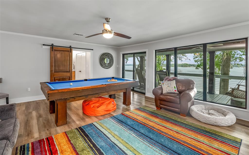 128 Knott Drive Many, LA 71449 - Photo 14 of 39 a living room with furniture and a large window