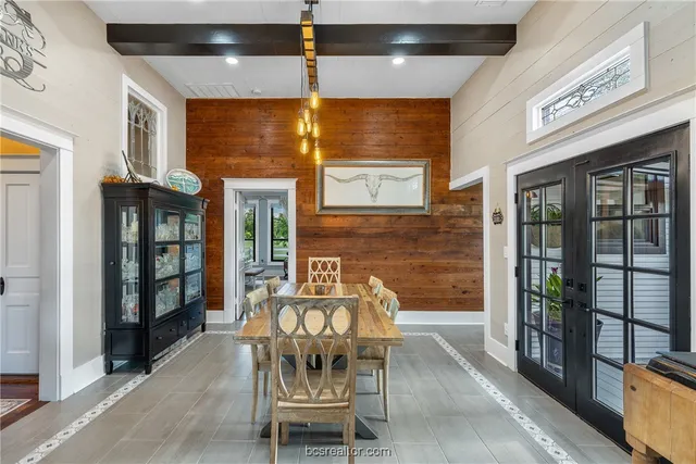 a patio with table and chairs