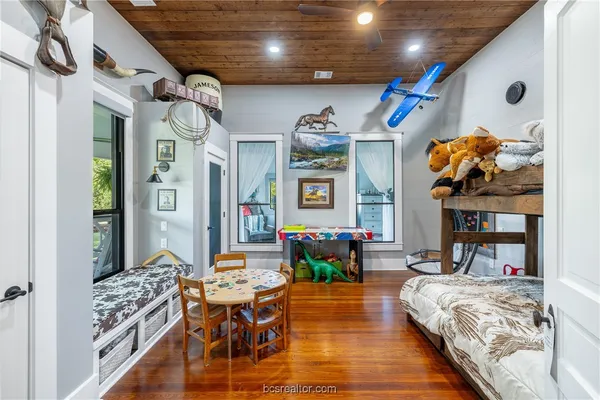 a living room with granite countertop furniture and a fireplace