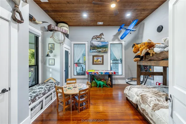 a living room with granite countertop furniture and a fireplace