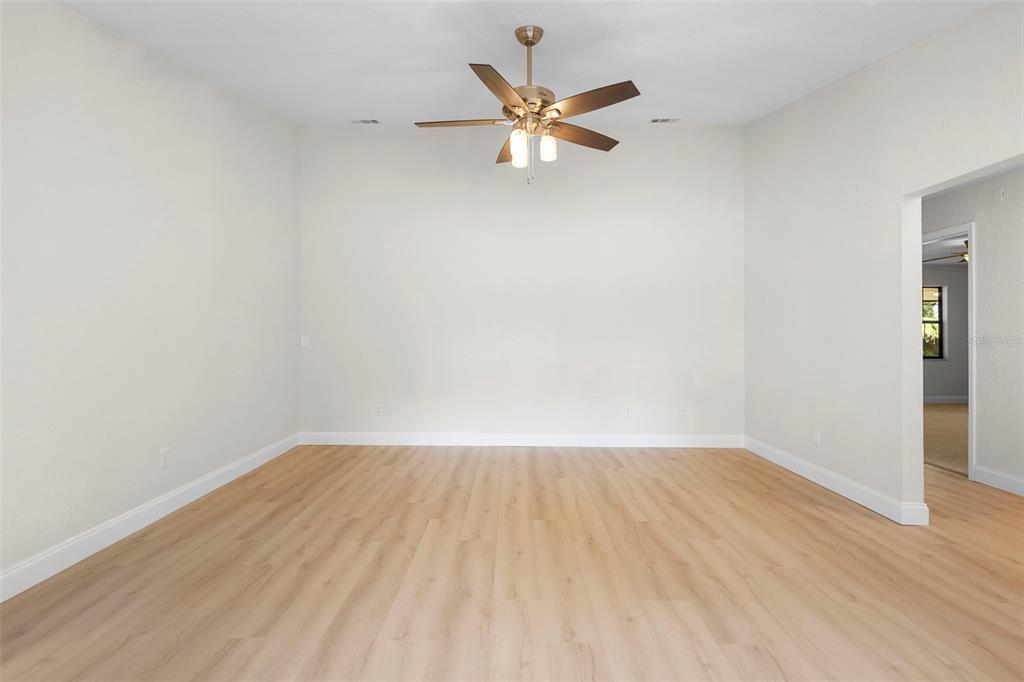 26 Laurianne Road DeBary, FL 32713 - Photo 14 of 41 a view of an empty room with wooden floor