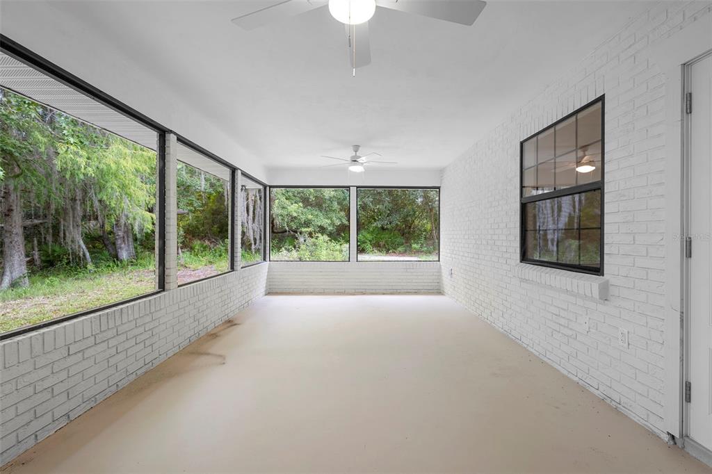 26 Laurianne Road DeBary, FL 32713 - Photo 18 of 41 a view of an empty room with windows and balcony