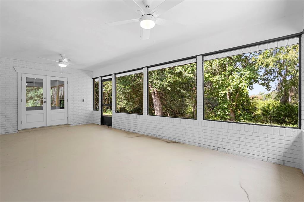 26 Laurianne Road DeBary, FL 32713 - Photo 19 of 41 an empty room with windows and ceiling fan