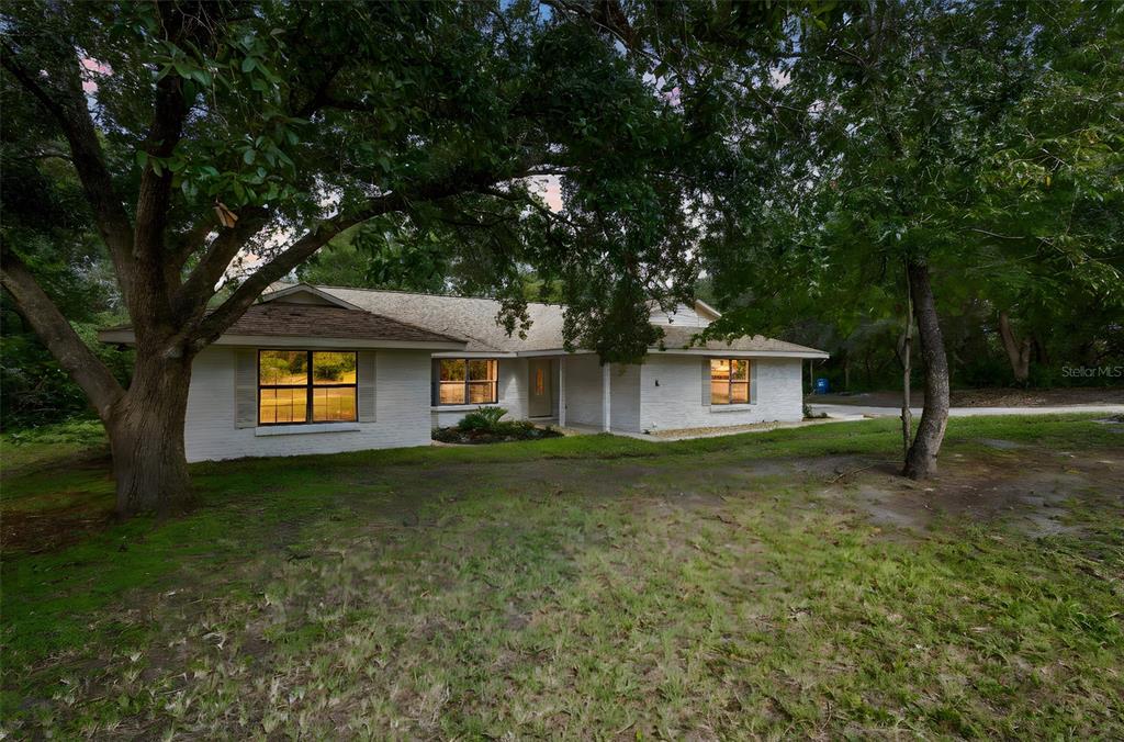 26 Laurianne Road DeBary, FL 32713 - Photo 2 of 41 a view of a trees in a yard with large trees