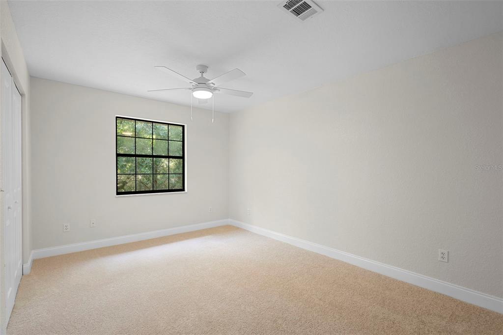 26 Laurianne Road DeBary, FL 32713 - Photo 29 of 41 an empty room with windows and fan