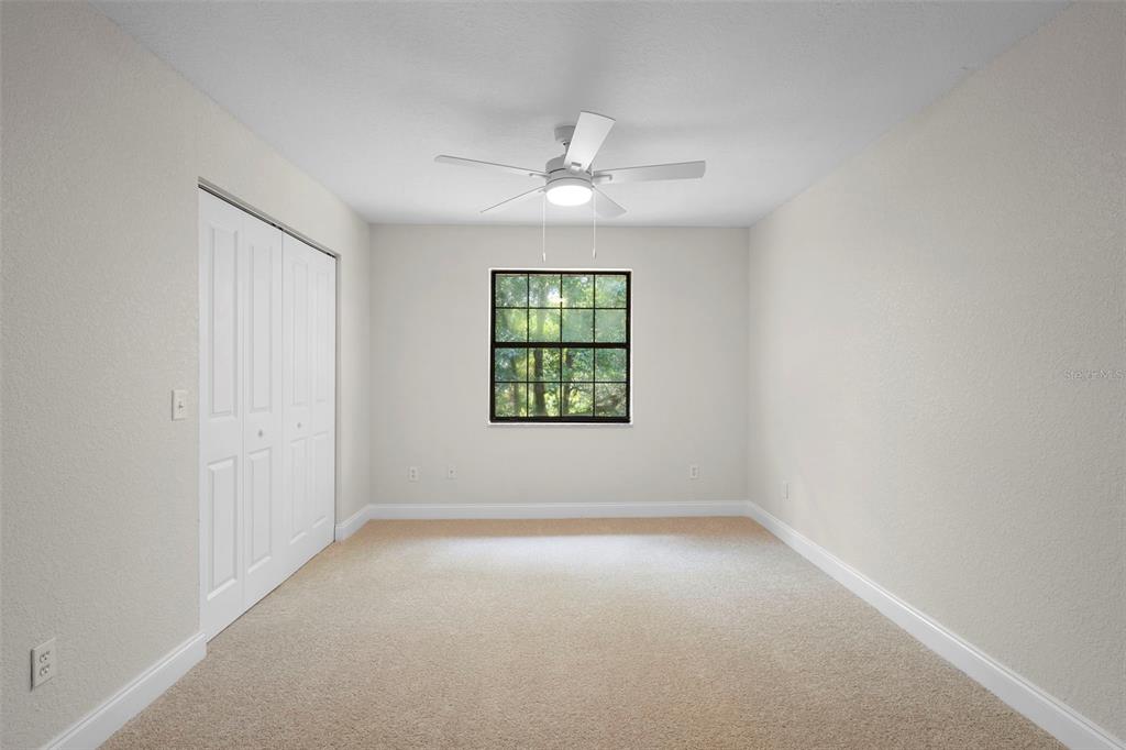 26 Laurianne Road DeBary, FL 32713 - Photo 30 of 41 an empty room with windows and ceiling fan