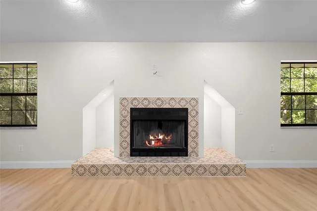 a living room with a fireplace