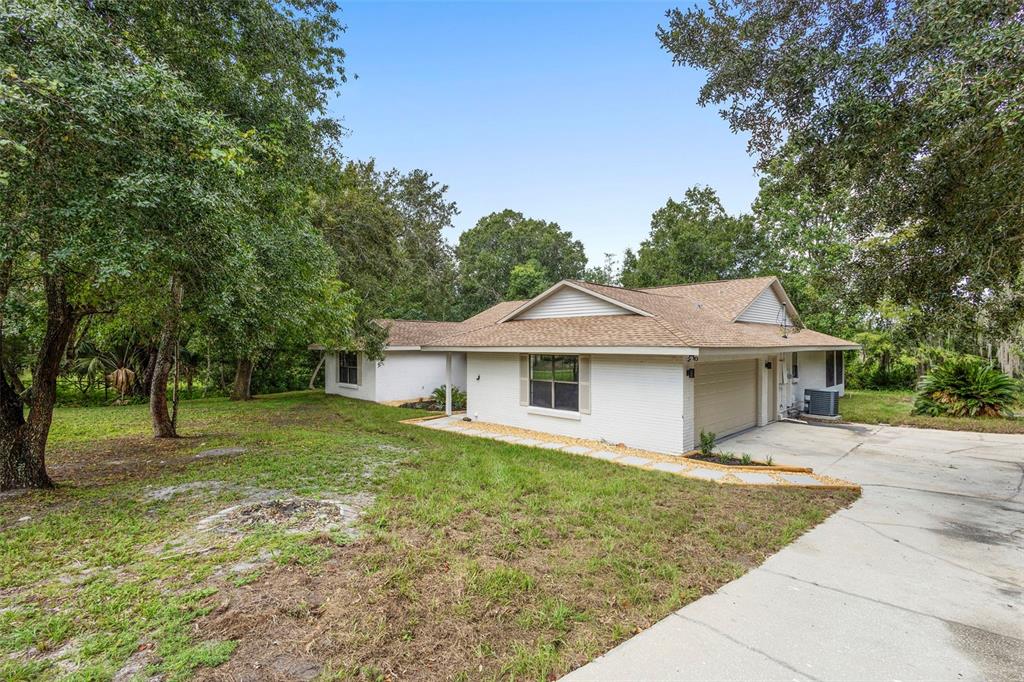26 Laurianne Road DeBary, FL 32713 - Photo 38 of 41 a front view of a house with a yard