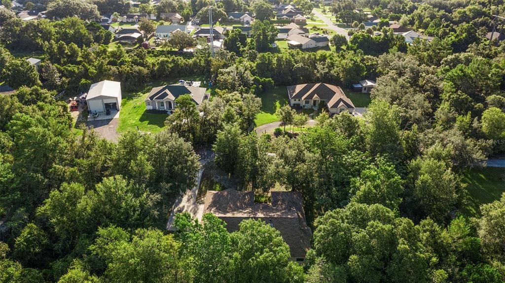 26 Laurianne Road DeBary, FL 32713 - Photo 40 of 41 an aerial view of residential house with outdoor space and trees all around