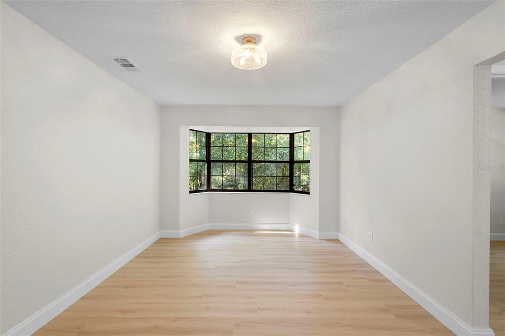 26 Laurianne Road DeBary, FL 32713 - Photo 9 of 41 a view of an empty room with a window
