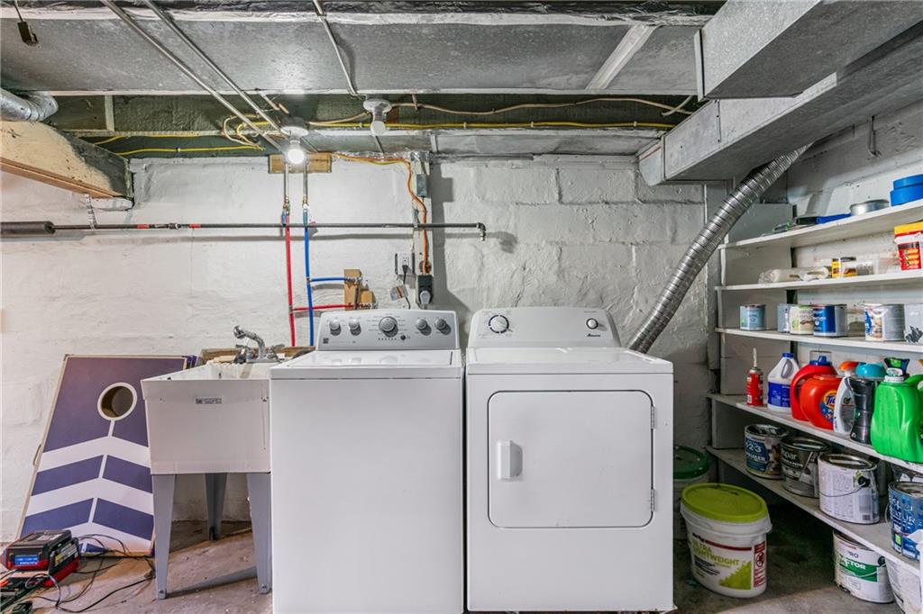 334 Orchard Street Springdale, PA 15144 - Photo 22 of 25 a utility room with dryer and washer