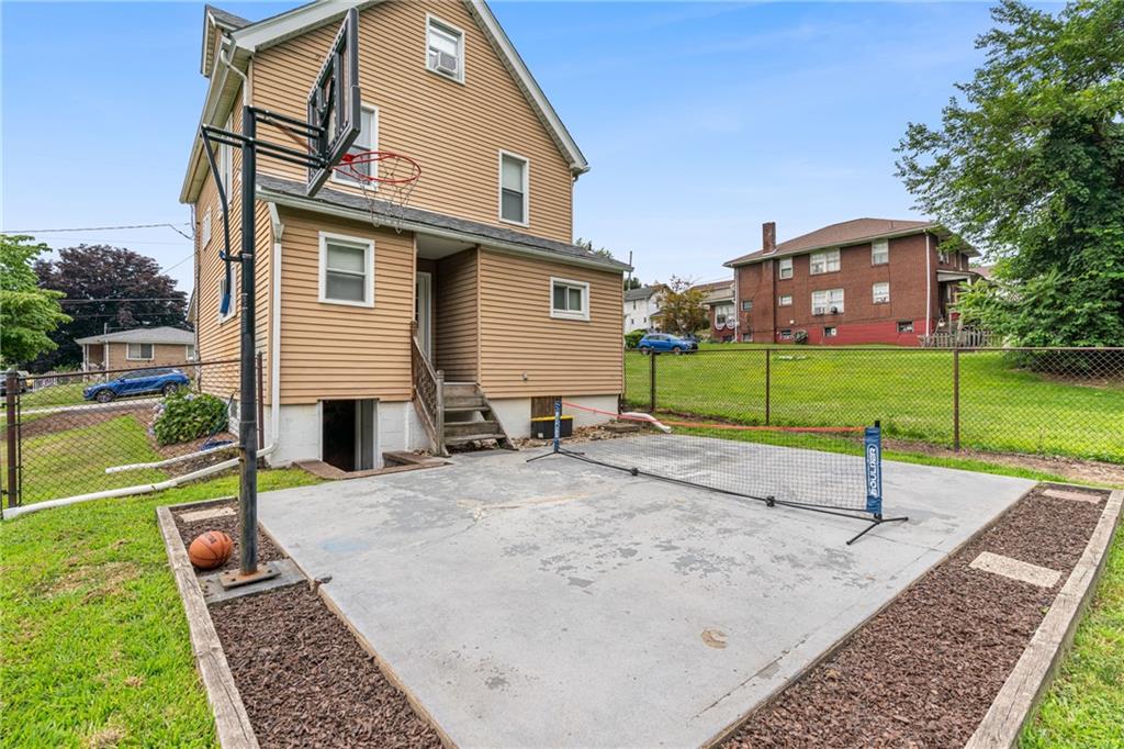334 Orchard Street Springdale, PA 15144 - Photo 25 of 25 a view of a house with a yard and a patio