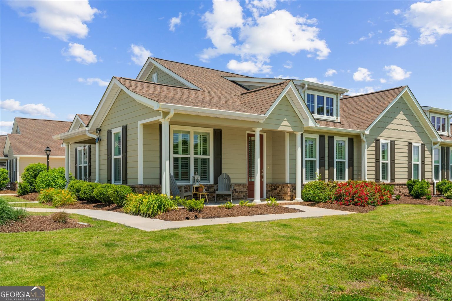 383 Pacer Lane, Unit 3 Dalton, GA 30721 - Photo 1 of 50 a front view of a house with a yard