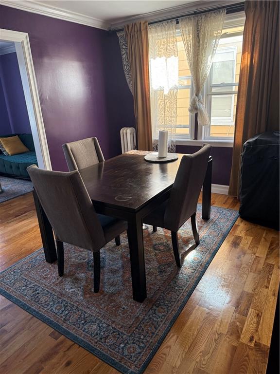 3016 Brighton 3rd Street Brooklyn, NY 11235 - Photo 13 of 21 a view of a dining room with furniture window and wooden floor