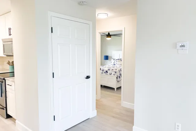 a view of livingroom with white furniture