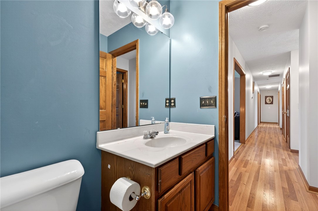 4996 Shannon Avenue Springfield, OH 45504 - Photo 41 of 61 This bathroom features a sleek vanity and convenient access to the home's common areas.