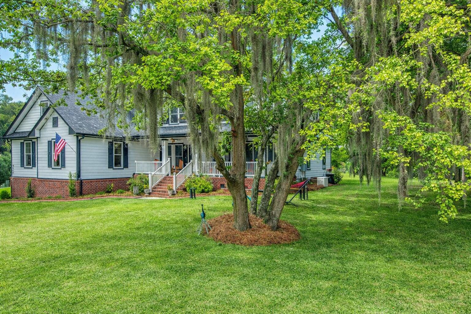 3687 Princess Pond Road Summerton, SC 29148 - Photo 2 of 80 3687 Princess Pond front green grass
