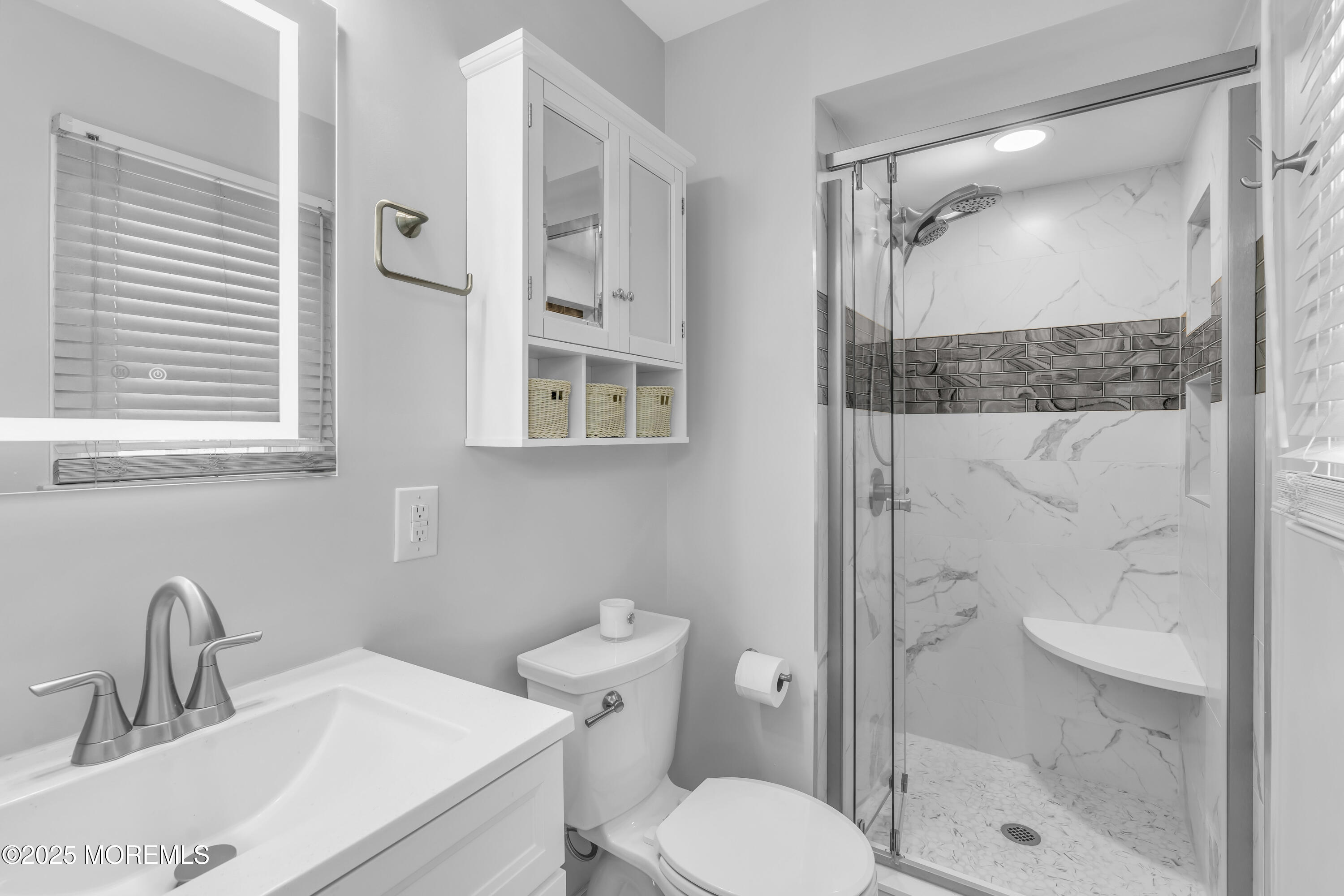 40 South Westfield Road Howell, NJ 07731 - Photo 18 of 36 a bathroom with a sink toilet and shower