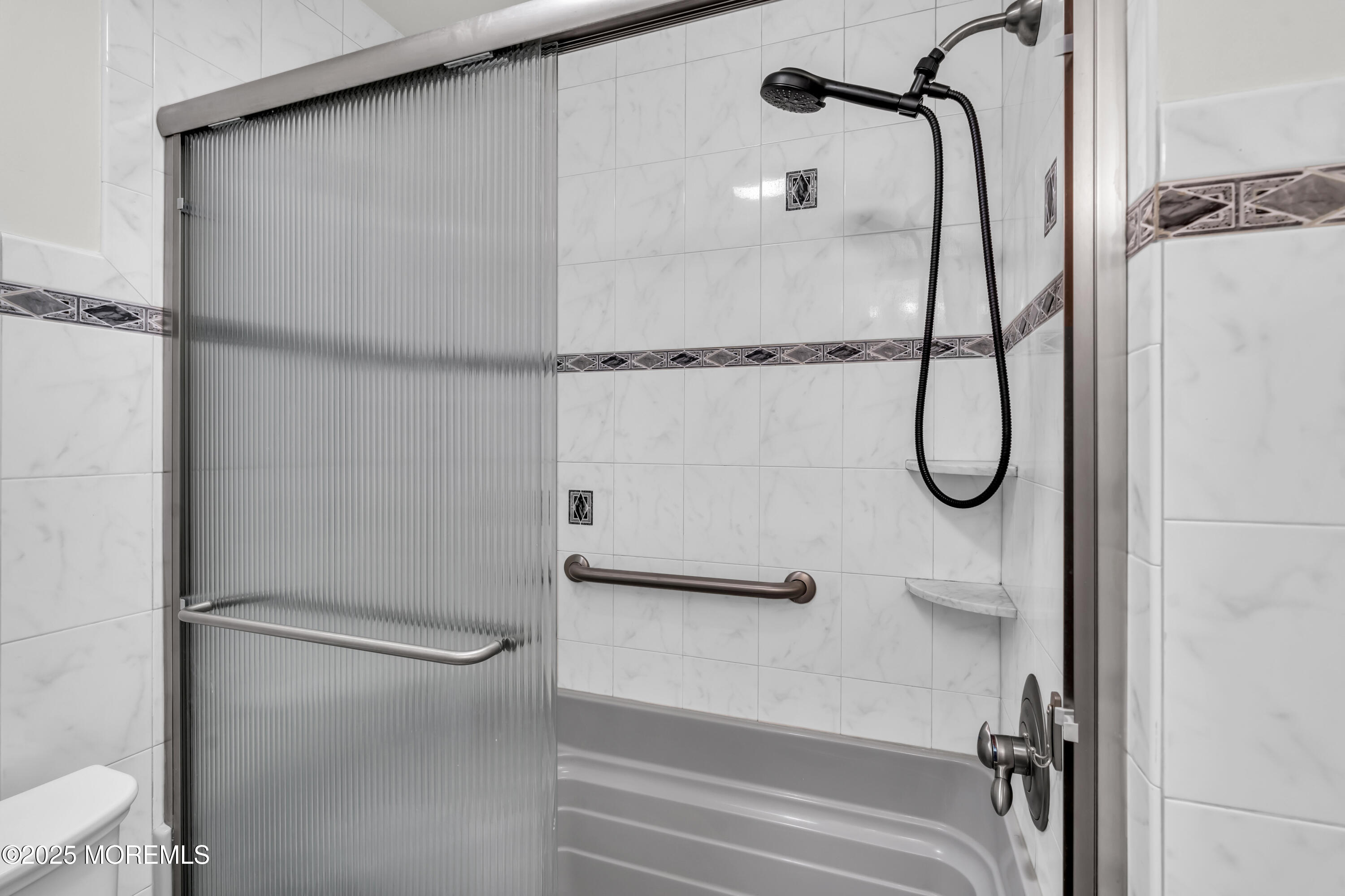40 South Westfield Road Howell, NJ 07731 - Photo 21 of 36 a bathroom with a shower and a toilet