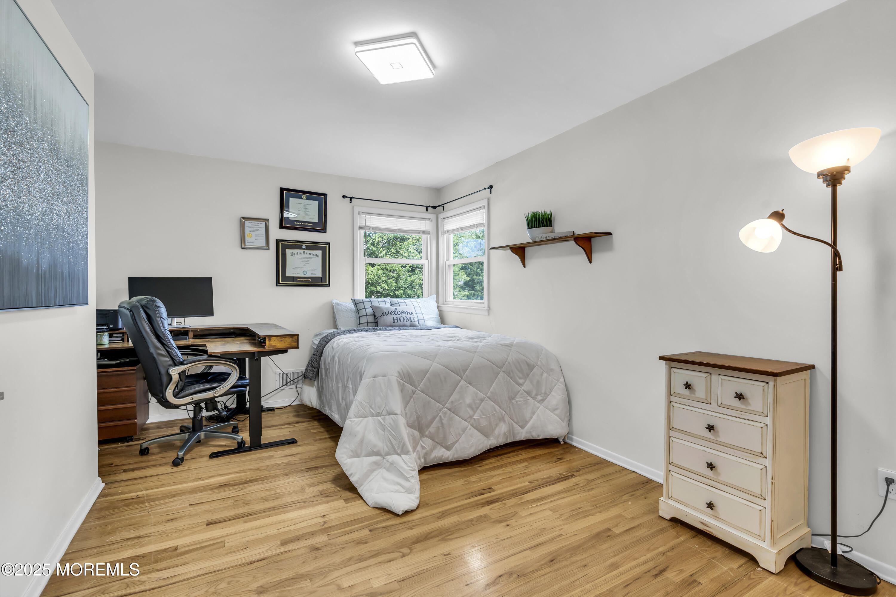 40 South Westfield Road Howell, NJ 07731 - Photo 26 of 36 a bedroom with a bed and wooden floor