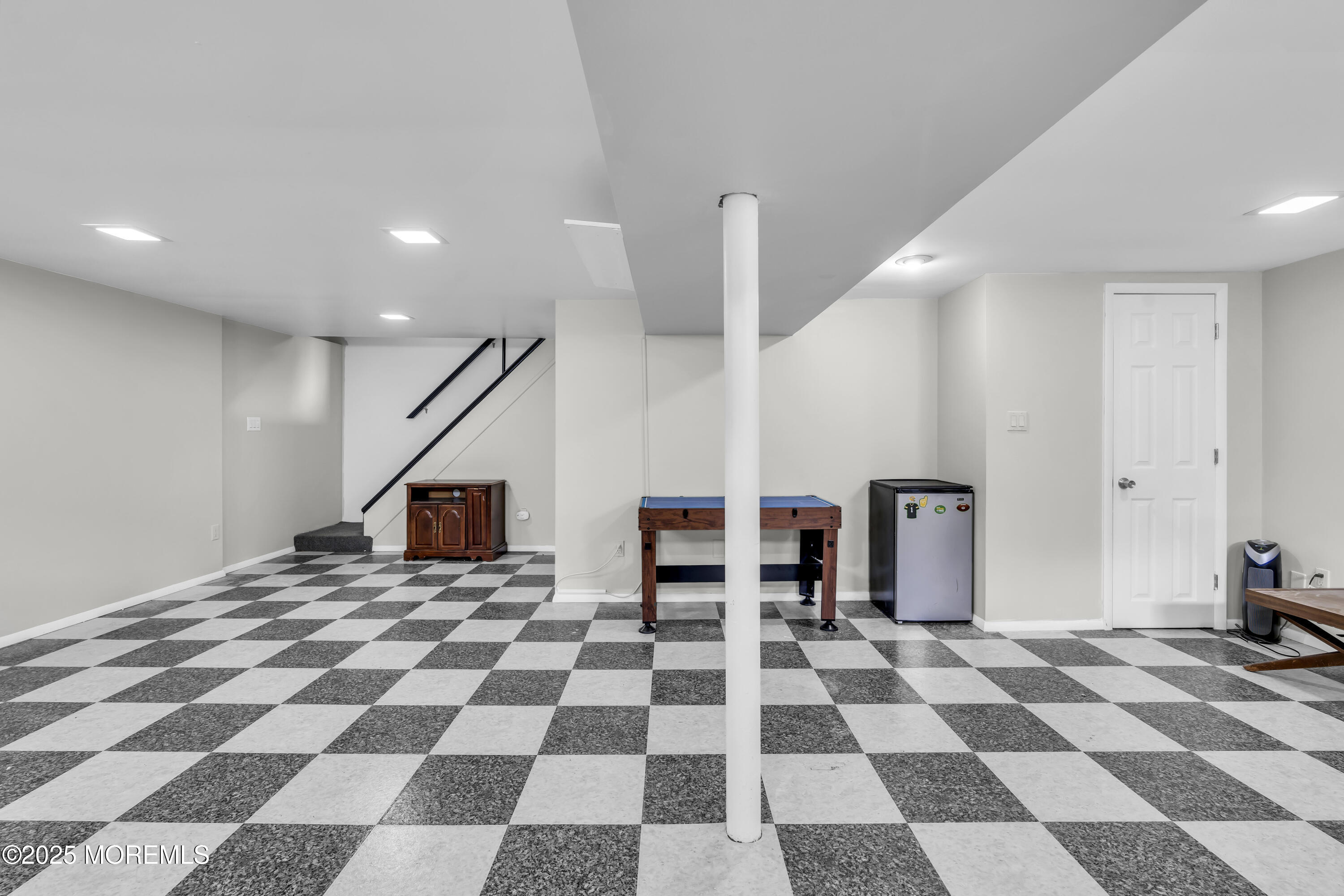 40 South Westfield Road Howell, NJ 07731 - Photo 29 of 36 a view of a hall with a black and white checkered floor