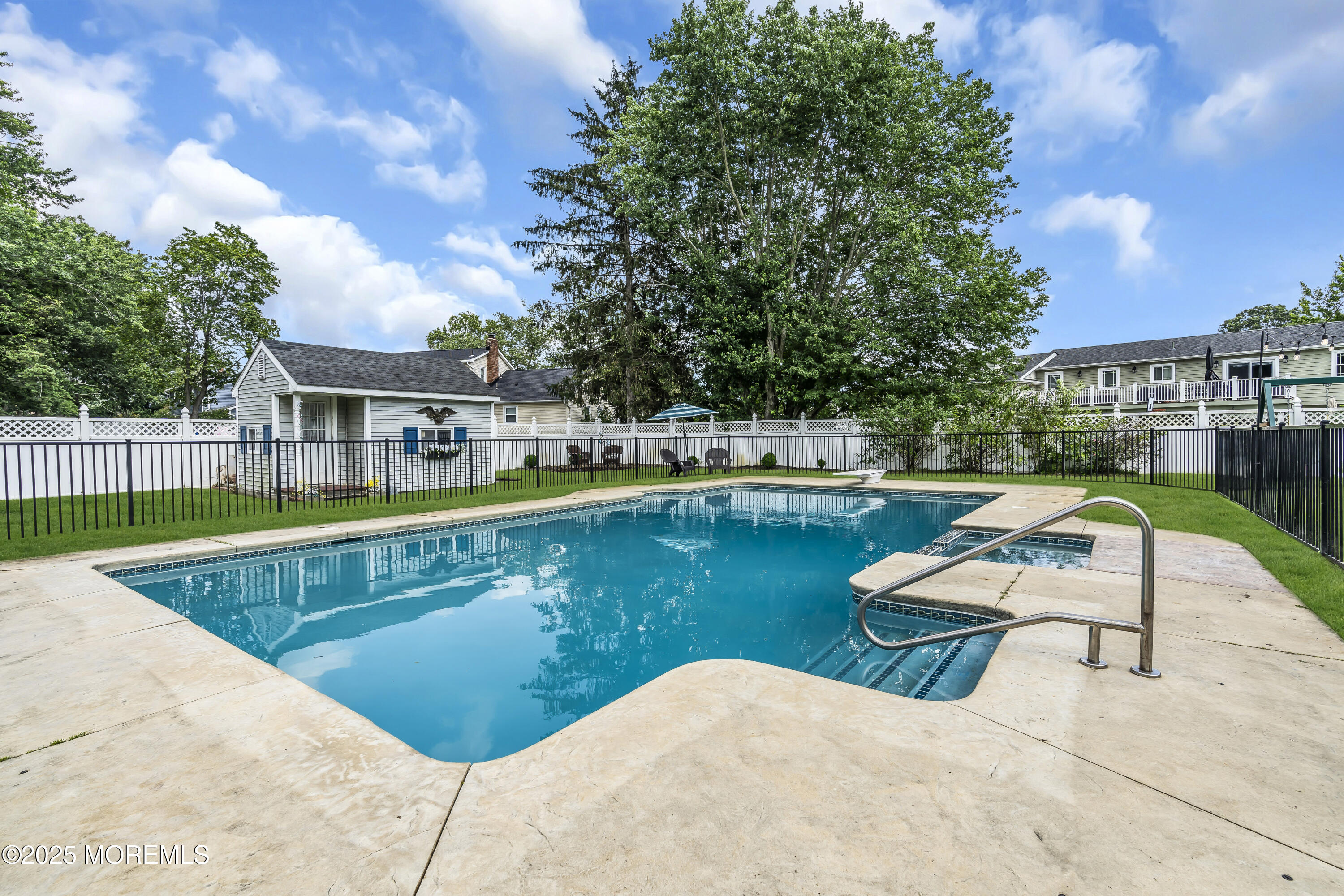 40 South Westfield Road Howell, NJ 07731 - Photo 30 of 36 a view of swimming pool with lounge chair