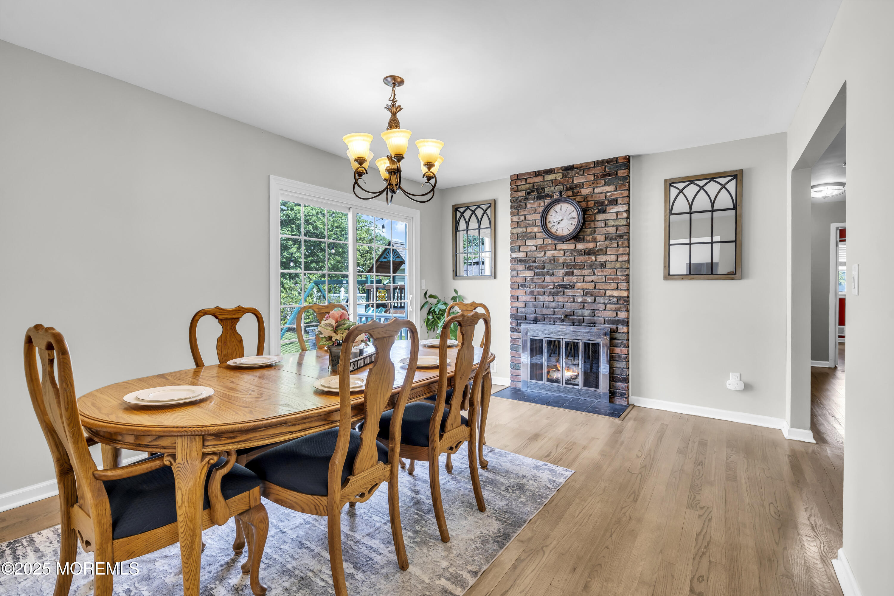 40 South Westfield Road Howell, NJ 07731 - Photo 8 of 36 a view of a dining room with furniture wooden floor and chandelier