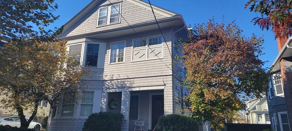119 Appleton Street, Unit 2 Cambridge, MA 02138 - Photo 1 of 1 a front view of a house with a tree