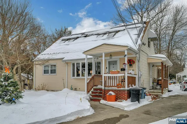 a front view of a house with porch