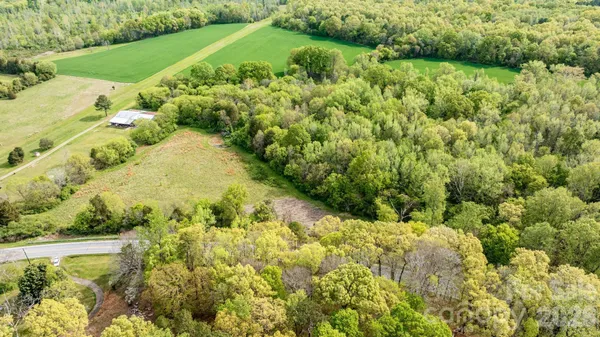a view of a garden with a building