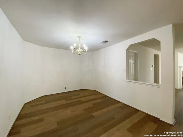 a view of a room with a fireplace