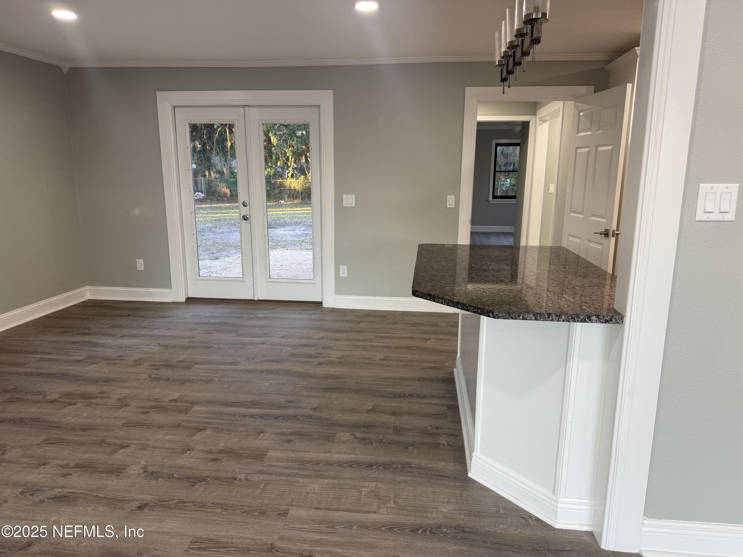 4901 Cedar Point Road Jacksonville, FL 32226 - Photo 6 of 15 wooden floor in an empty room