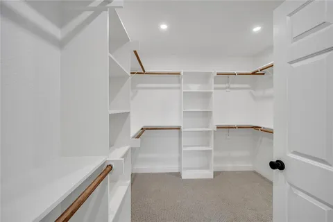 a view of an empty walk in closet