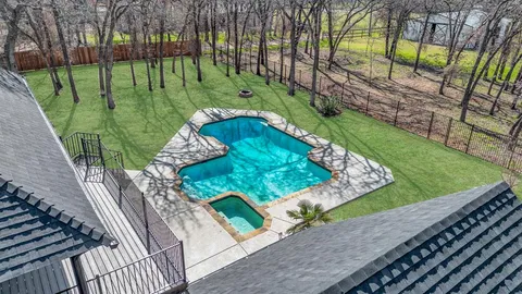 a view of a garden from a balcony