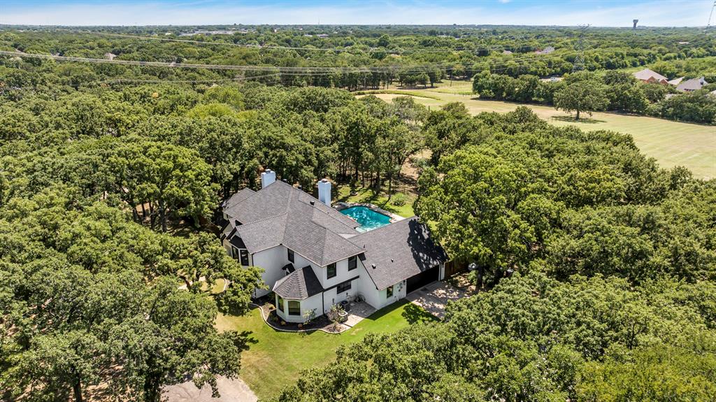 7004 Ledbetter Road Arlington, TX 76001 - Photo 8 of 39 an aerial view of a house with a yard
