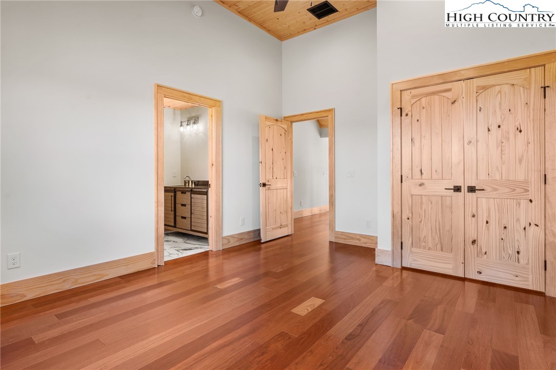 171 Pleasant View Vilas, NC 28692 - Photo 27 of 49 an empty room with wooden floor