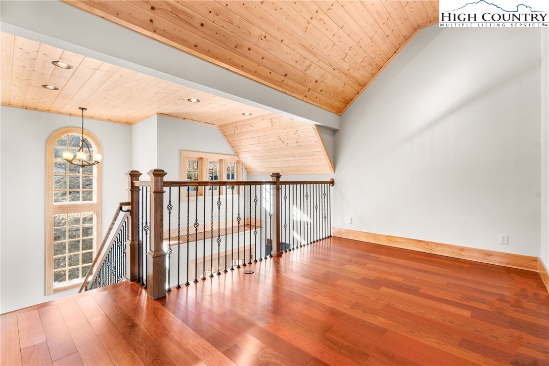171 Pleasant View Vilas, NC 28692 - Photo 32 of 49 wooden floor in an empty room with a window