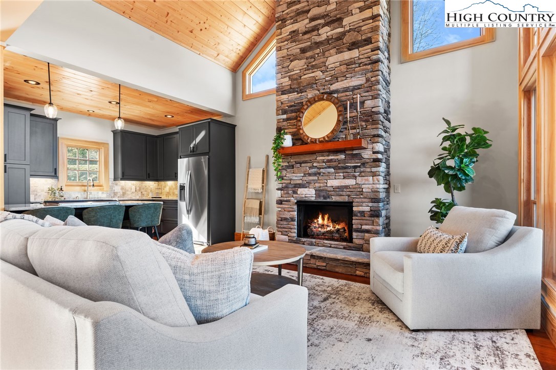 171 Pleasant View Vilas, NC 28692 - Photo 8 of 49 a living room with furniture and a fireplace